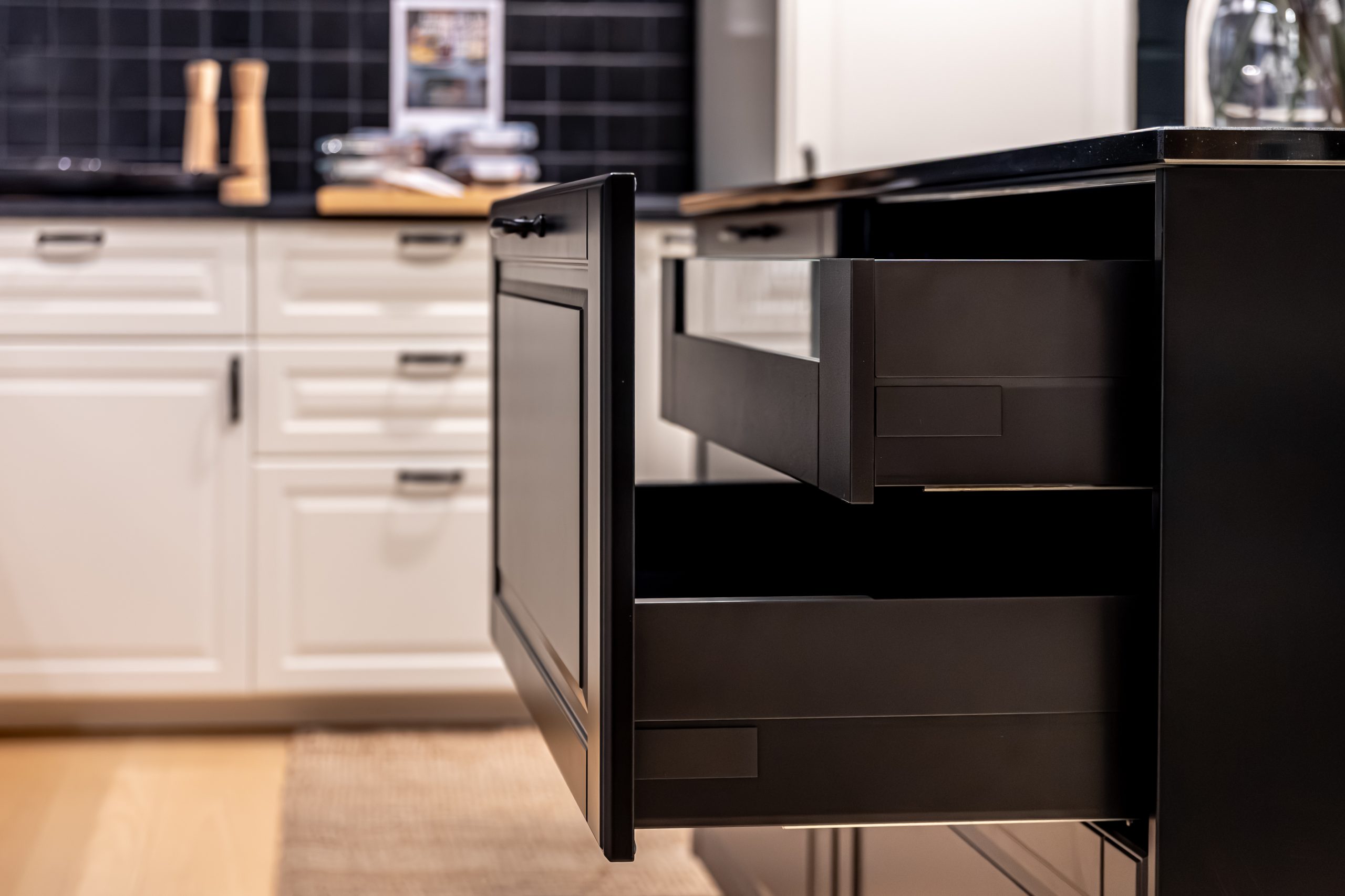 black-kitchen-island-with-open-drawer-dark-aesthetic